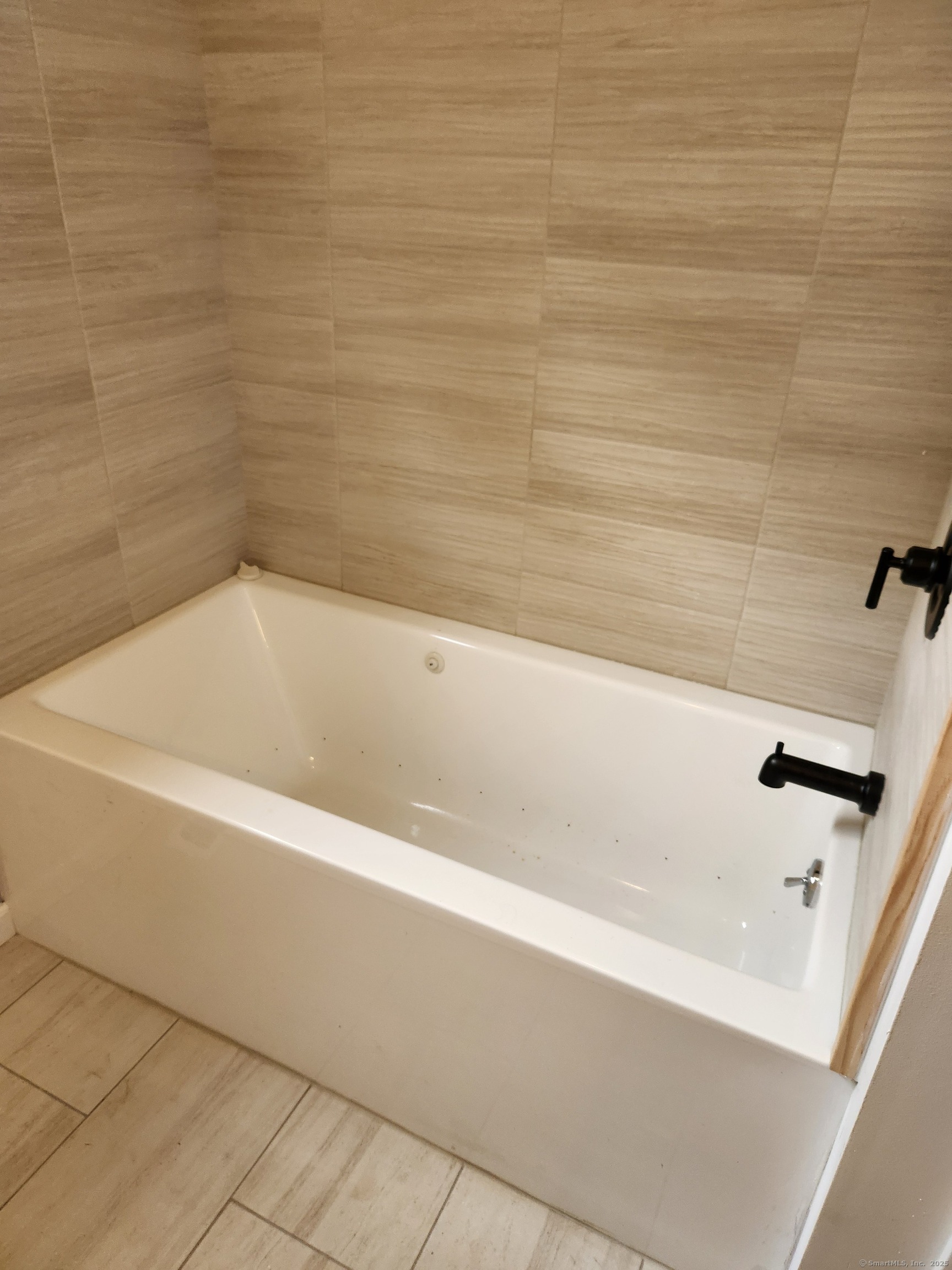 154 Falls Road East Haddam, CT 06469 - Photo 16 of 39 a bathroom with a bathtub