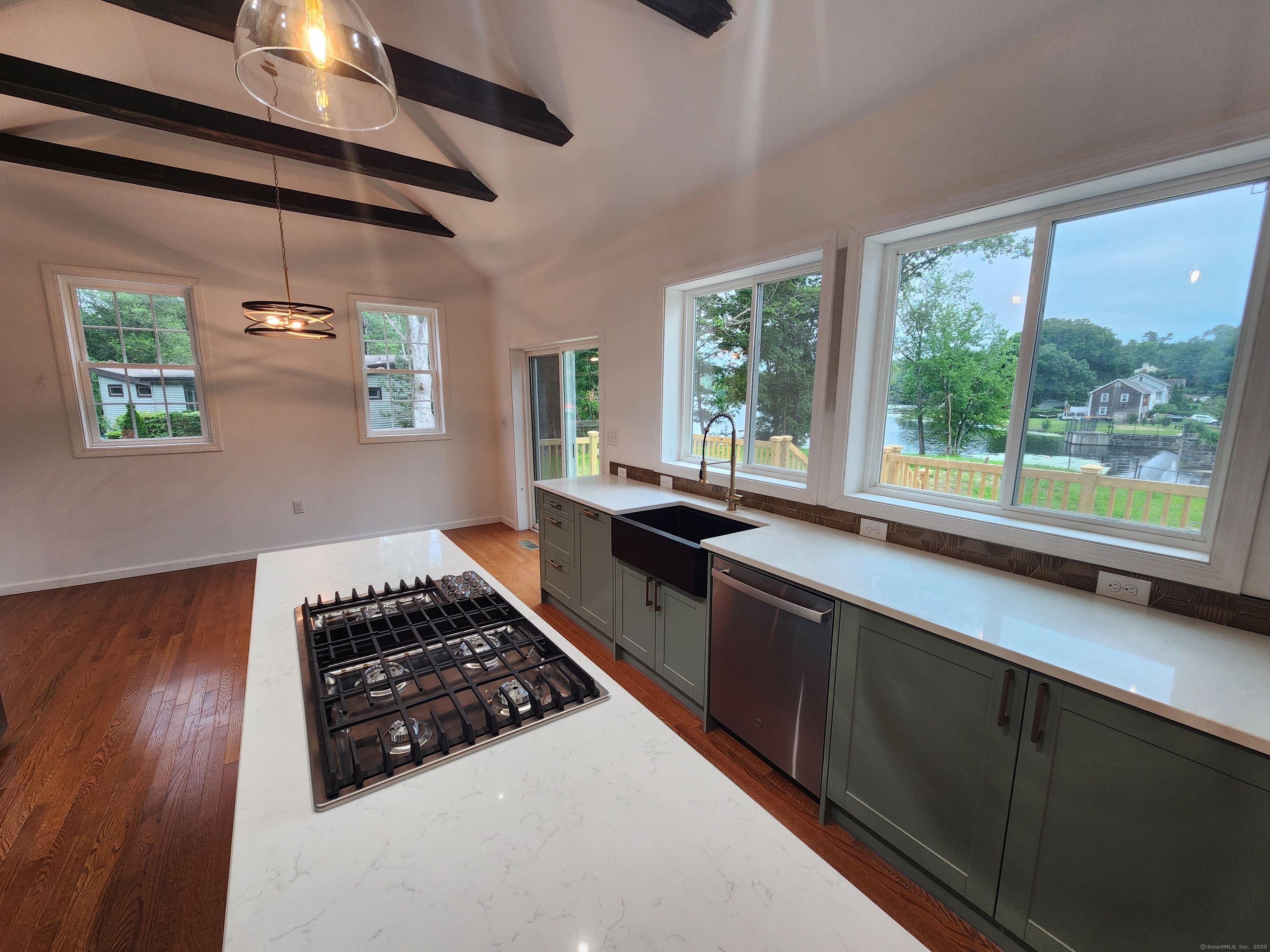 154 Falls Road East Haddam, CT 06469 - Photo 5 of 39 a kitchen with a sink a stove and a window