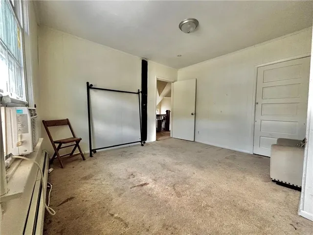 a view of a livingroom with a staircase