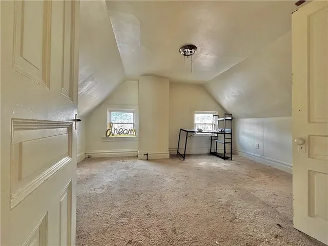 a view of a livingroom with a staircase