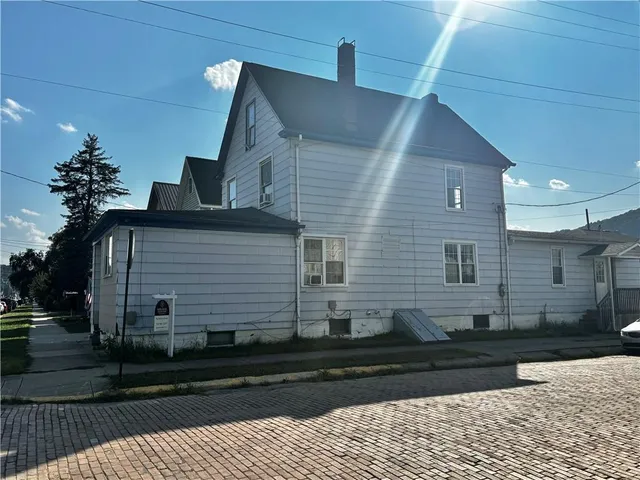 a view of a house with a patio
