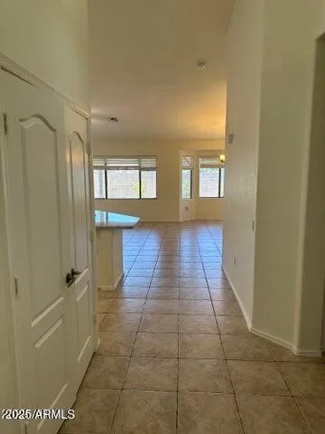 a bathroom with a glass door shower