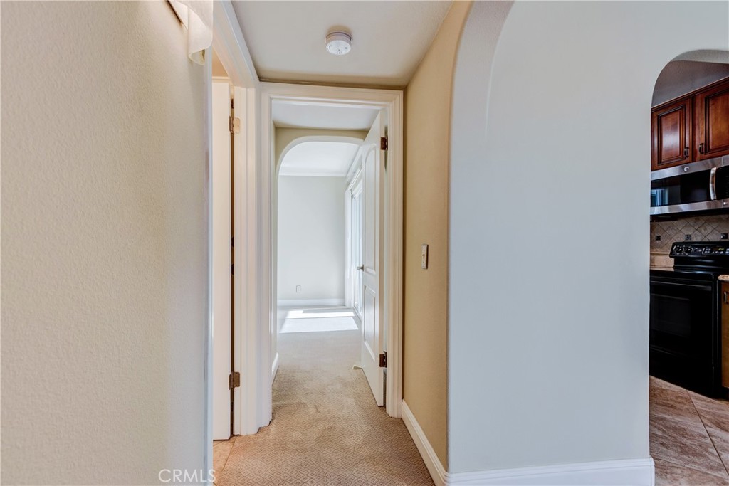 34004 Selva Road, Unit 384 Dana Point, CA 92629 - Photo 14 of 35 a view of a hallway with closet and a window