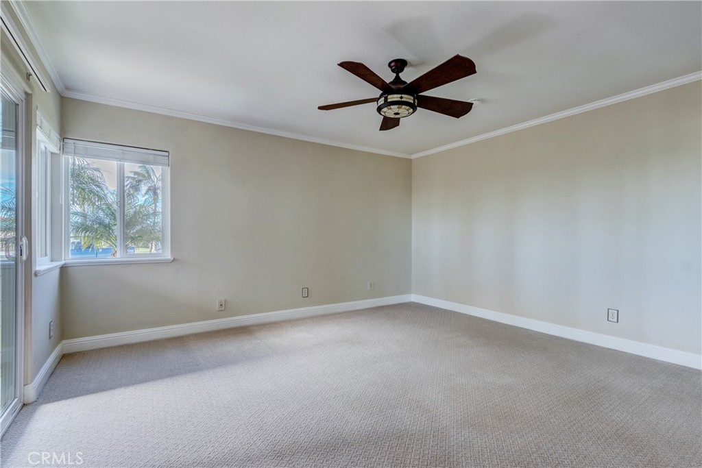 34004 Selva Road, Unit 384 Dana Point, CA 92629 - Photo 18 of 35 an empty room with a window and a fan