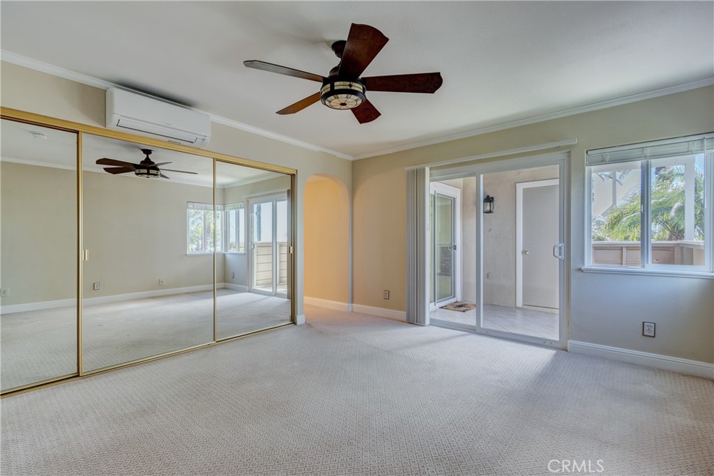 34004 Selva Road, Unit 384 Dana Point, CA 92629 - Photo 19 of 35 a view of empty room with wooden floor and fan