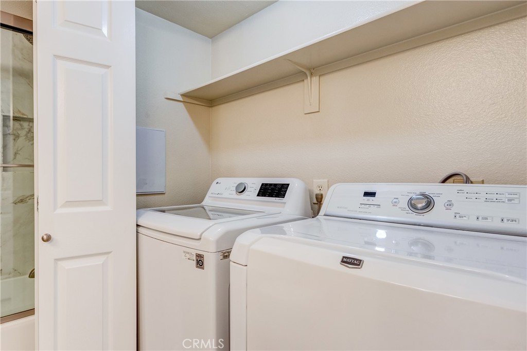 34004 Selva Road, Unit 384 Dana Point, CA 92629 - Photo 26 of 35 a utility room with dryer and washer