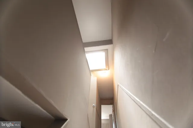 a view of hallway with stairs