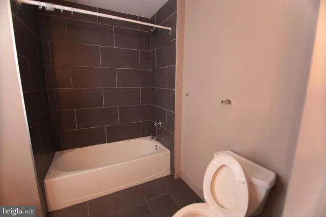 a bathroom with a bath tub