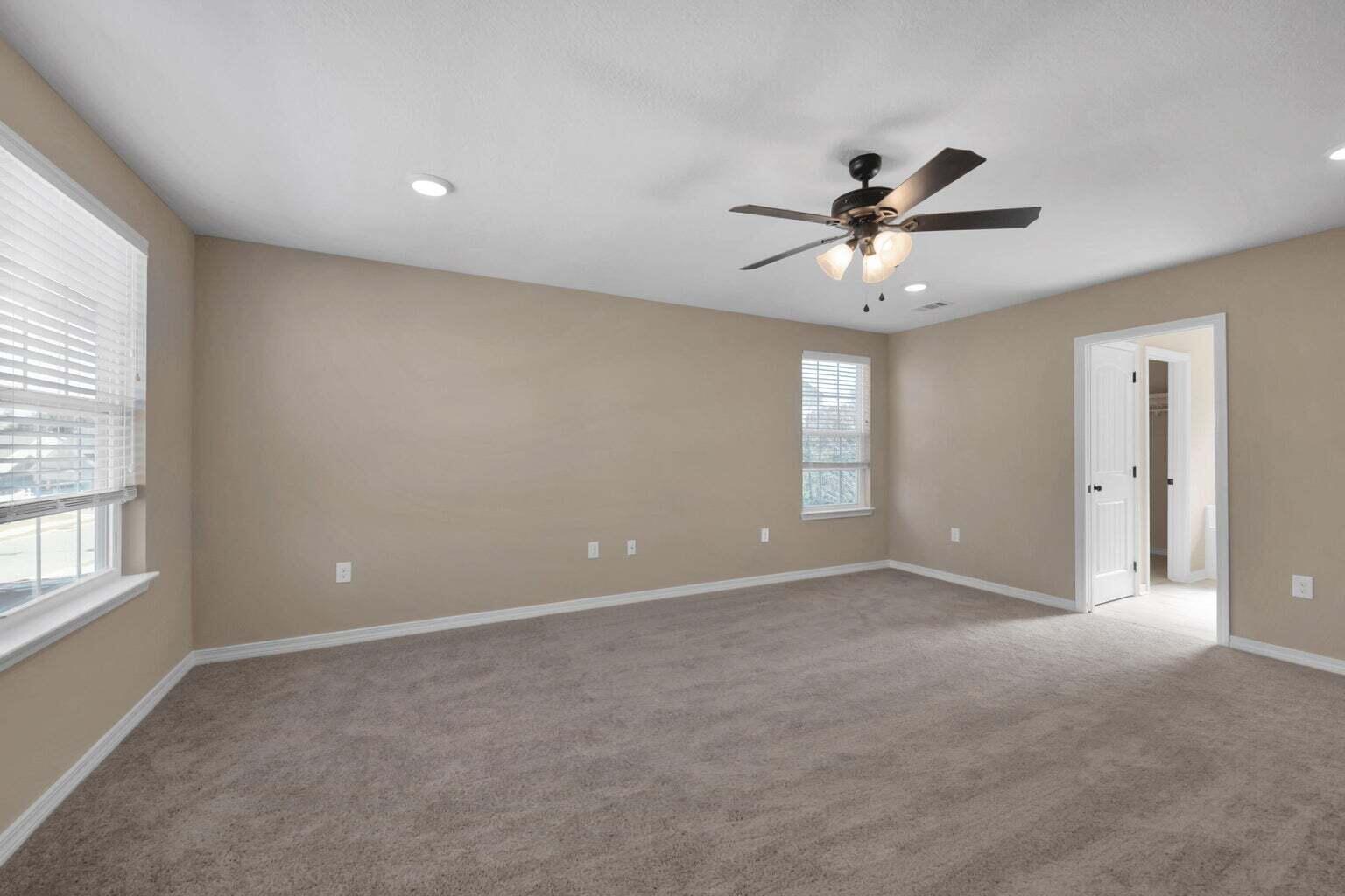 446 Eisenhower Drive Crestview, FL 32539 - Photo 15 of 25 a view of a room with a ceiling fan and a window