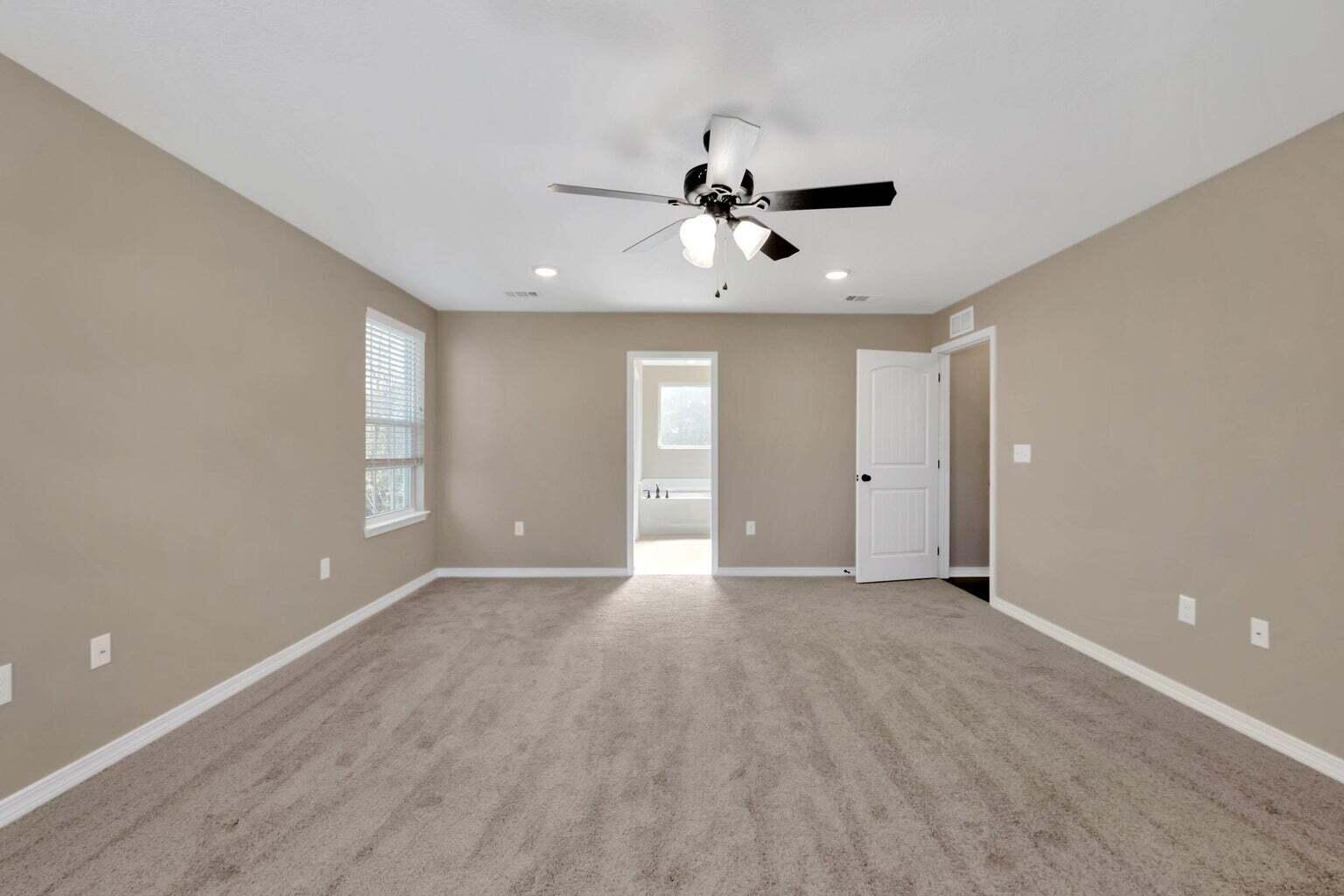 446 Eisenhower Drive Crestview, FL 32539 - Photo 16 of 25 a view of an empty room with a window