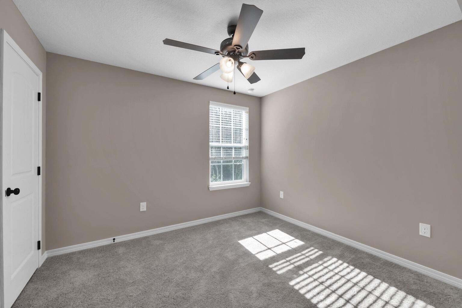 446 Eisenhower Drive Crestview, FL 32539 - Photo 23 of 25 a view of an empty room with a window