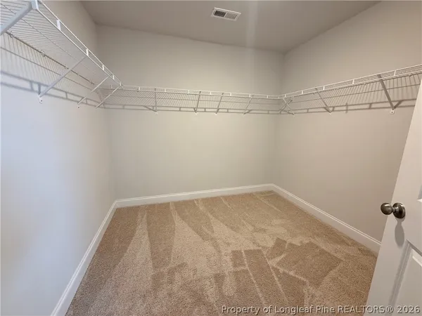 a view of a room with racks on the wall