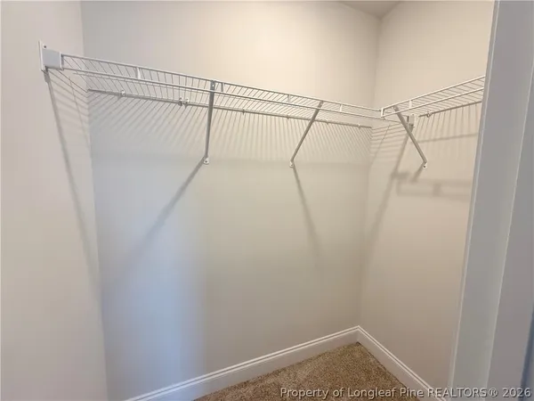 a view of a room with racks on the wall