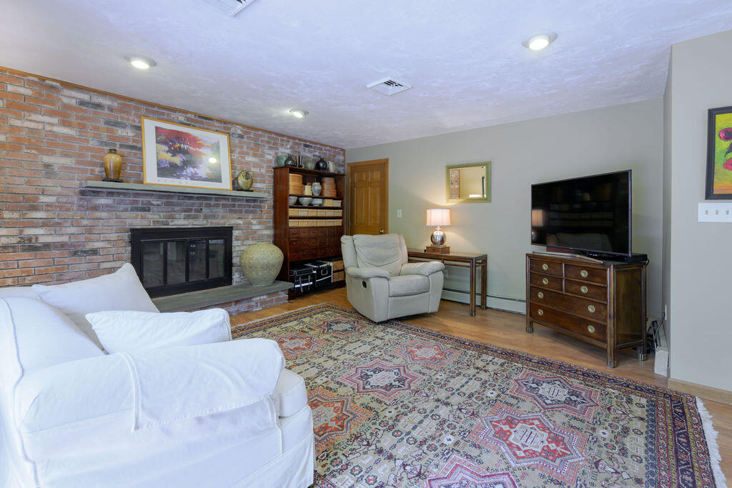 84 Popple Bottom Road Sandwich, MA 02537 - Photo 11 of 41 Den with fireplace
