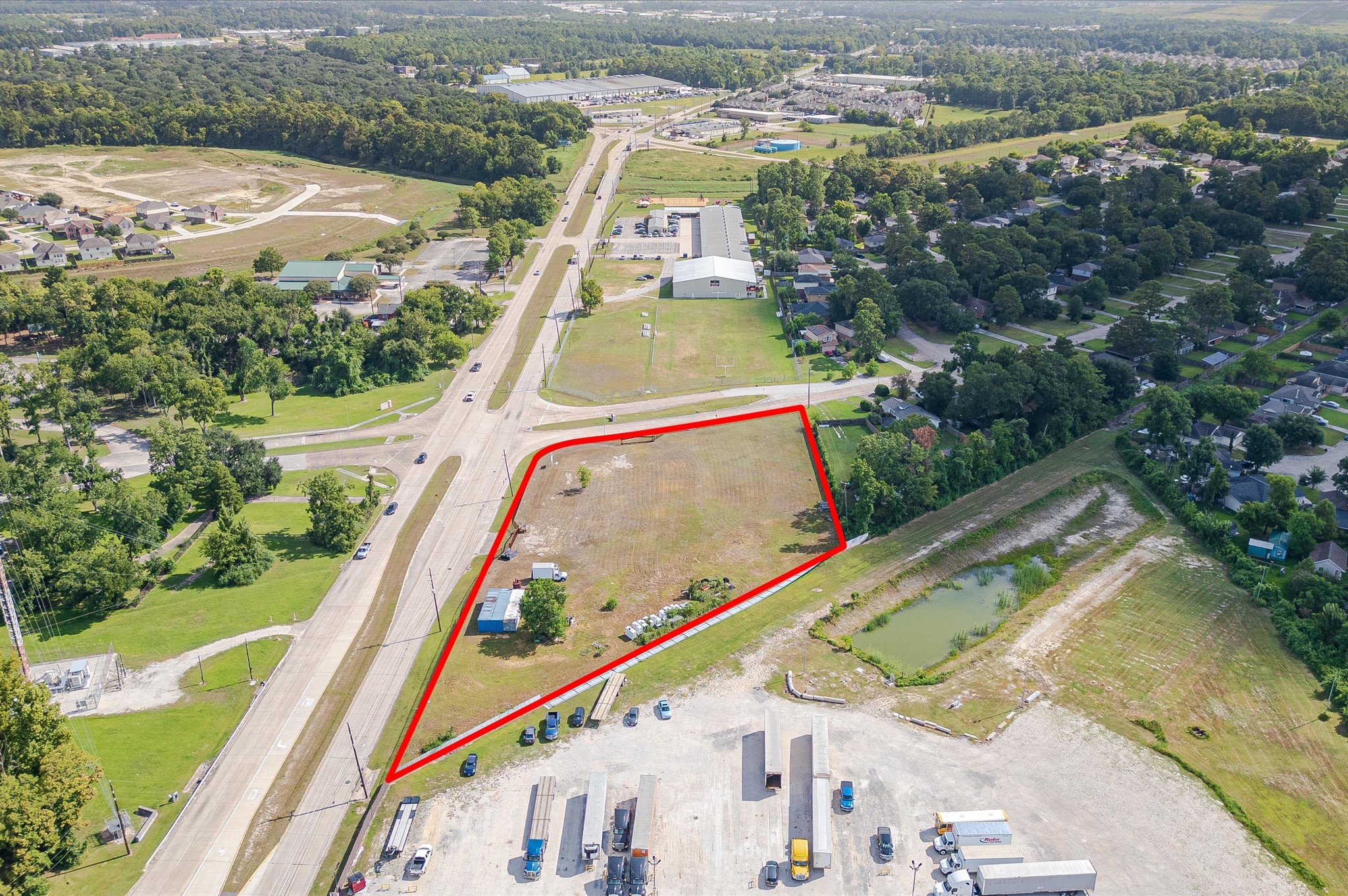 16030 Old Humble Road Humble, TX 77396 - Photo 3 of 17 an aerial view of a house with a yard