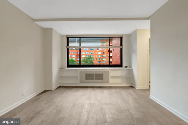 a living room with a flat screen tv