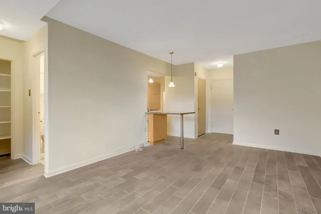a view of a livingroom with wooden floor