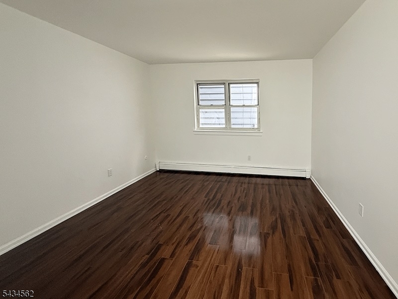 19 Van Rensselear Street, Unit 2 Belleville, NJ 07109 - Photo 5 of 7 wooden floor in a room