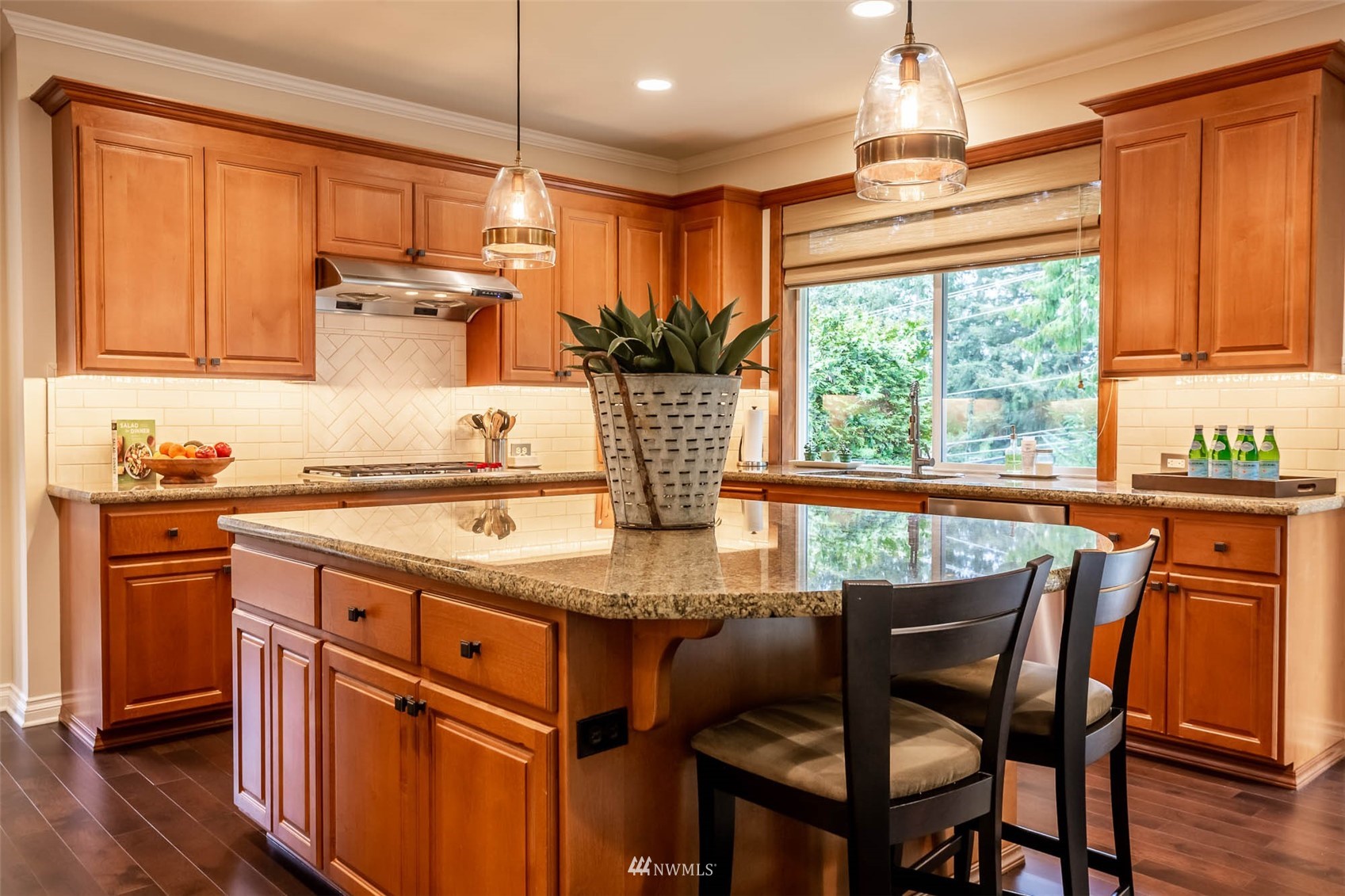 1903 240th Place Southeast Bothell, WA 98021 - Photo 13 of 36 a kitchen with stainless steel appliances granite countertop wooden cabinets and a refrigerator