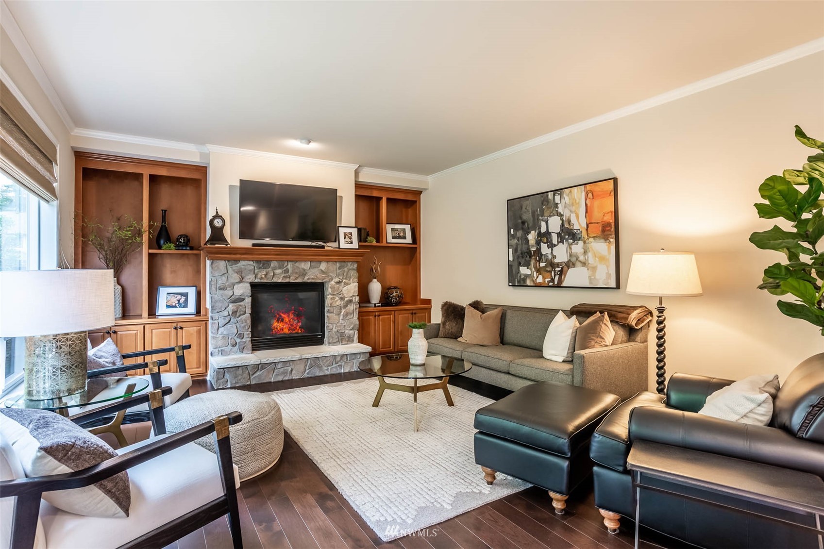 1903 240th Place Southeast Bothell, WA 98021 - Photo 16 of 36 a living room with furniture and a fireplace