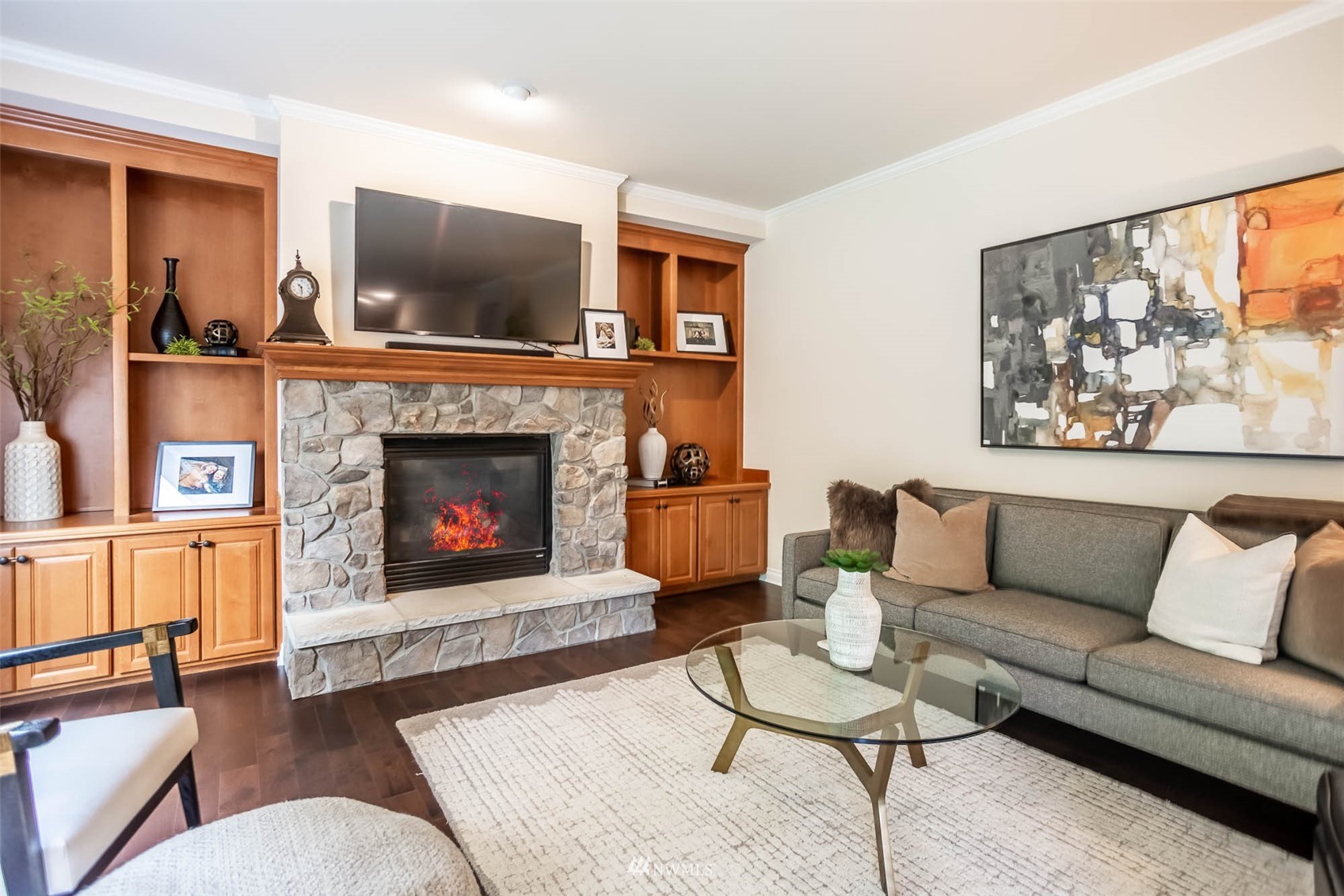 1903 240th Place Southeast Bothell, WA 98021 - Photo 17 of 36 a living room with furniture and a fireplace