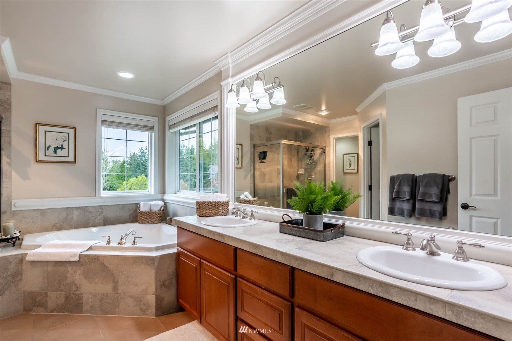 1903 240th Place Southeast Bothell, WA 98021 - Photo 24 of 36 a bathroom with a tub sink and mirror