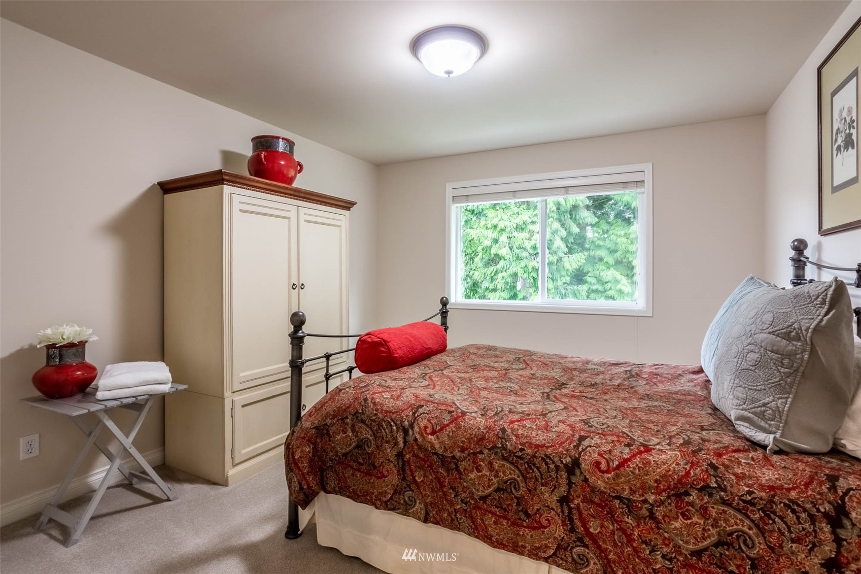 1903 240th Place Southeast Bothell, WA 98021 - Photo 26 of 36 a bedroom with a bed and a window