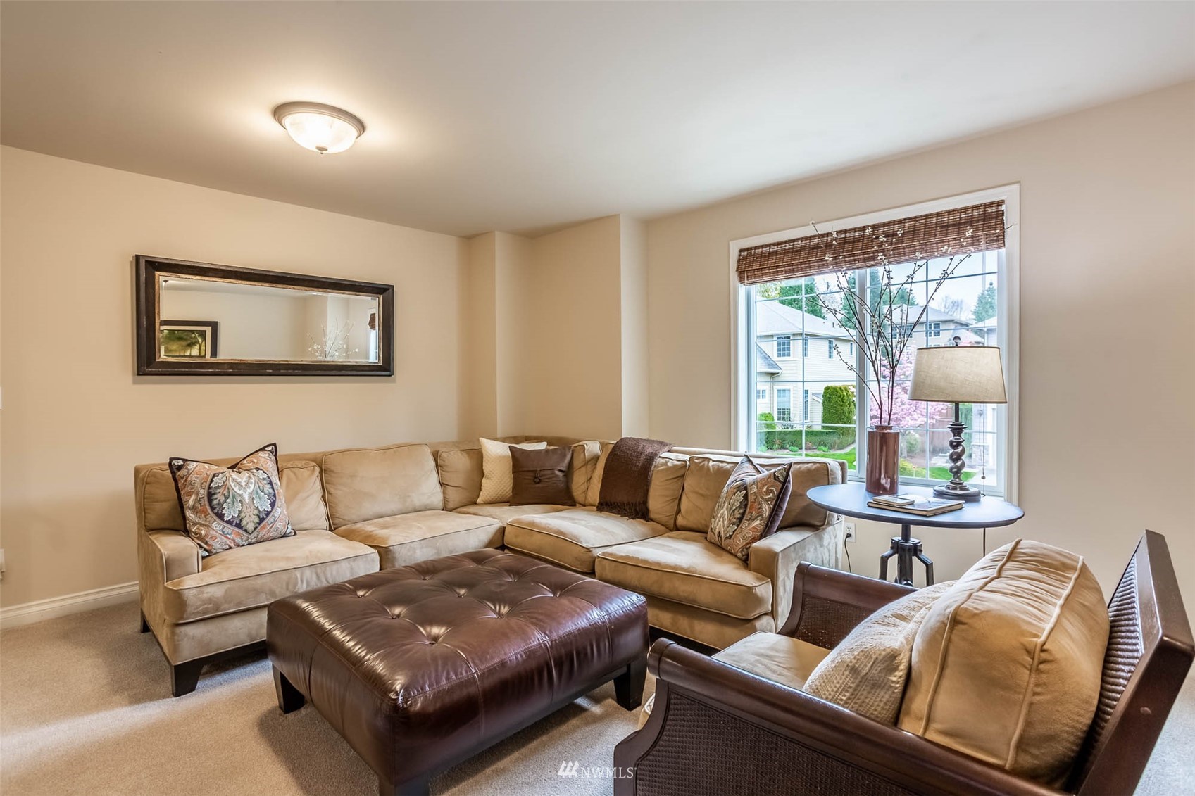 1903 240th Place Southeast Bothell, WA 98021 - Photo 31 of 36 a living room with furniture and a large window