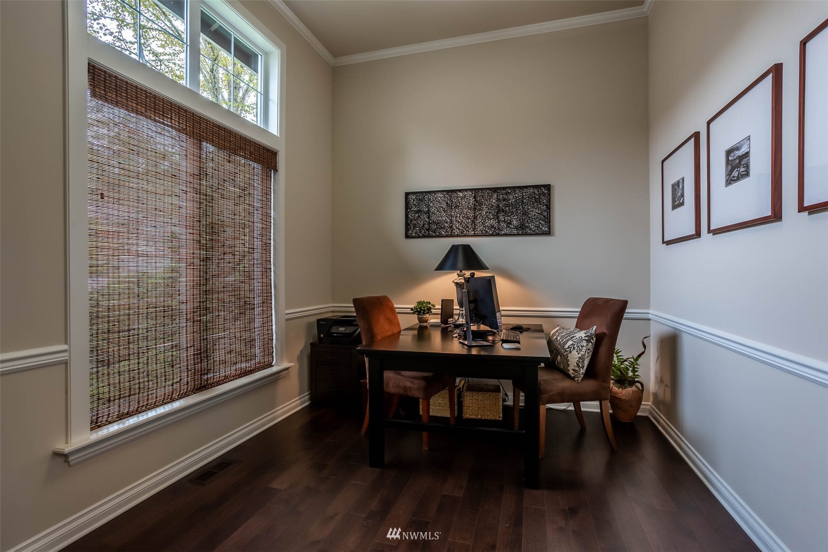 1903 240th Place Southeast Bothell, WA 98021 - Photo 5 of 36 a view of a workspace with furniture and wooden floor