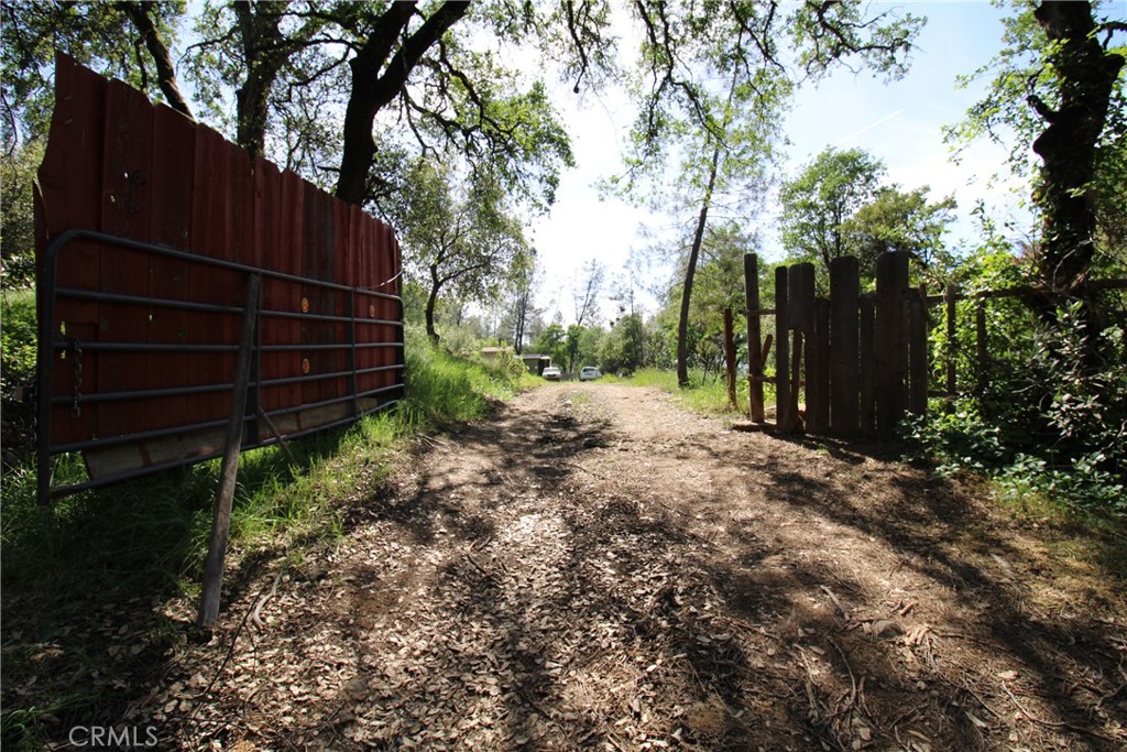 0 Black Bart Road Oroville, CA 95966 - Photo 2 of 38 a view of wooden fence and trees