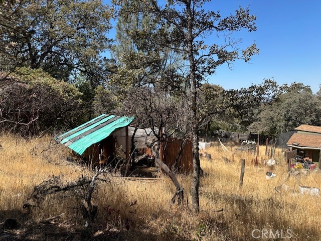 0 Black Bart Road Oroville, CA 95966 - Photo 7 of 16 a backyard of a house with lots of green space