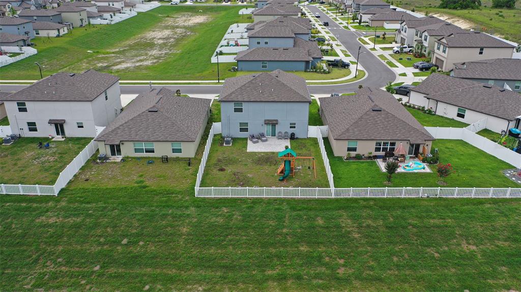 11693 Lavender Loop Spring Hill Spring Hill, FL 34609 - Photo 2 of 34 an aerial view of a house