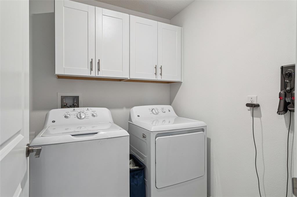 11693 Lavender Loop Spring Hill Spring Hill, FL 34609 - Photo 27 of 34 a utility room with dryer and washer