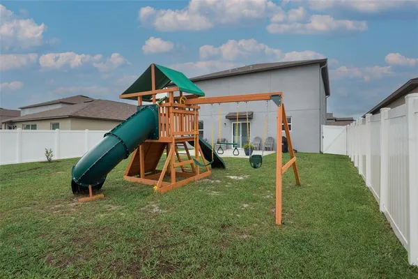 a view of a house with a park