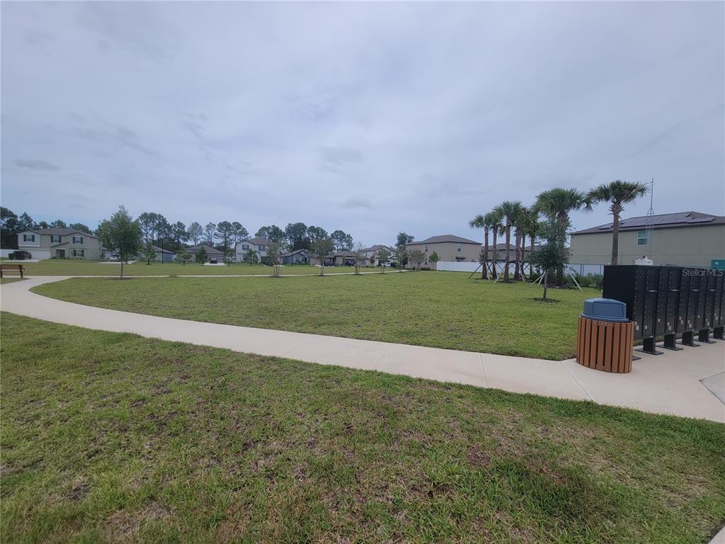 11693 Lavender Loop Spring Hill Spring Hill, FL 34609 - Photo 34 of 34 a view of a golf course with a lake