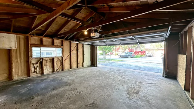 a view of porch with red and white door