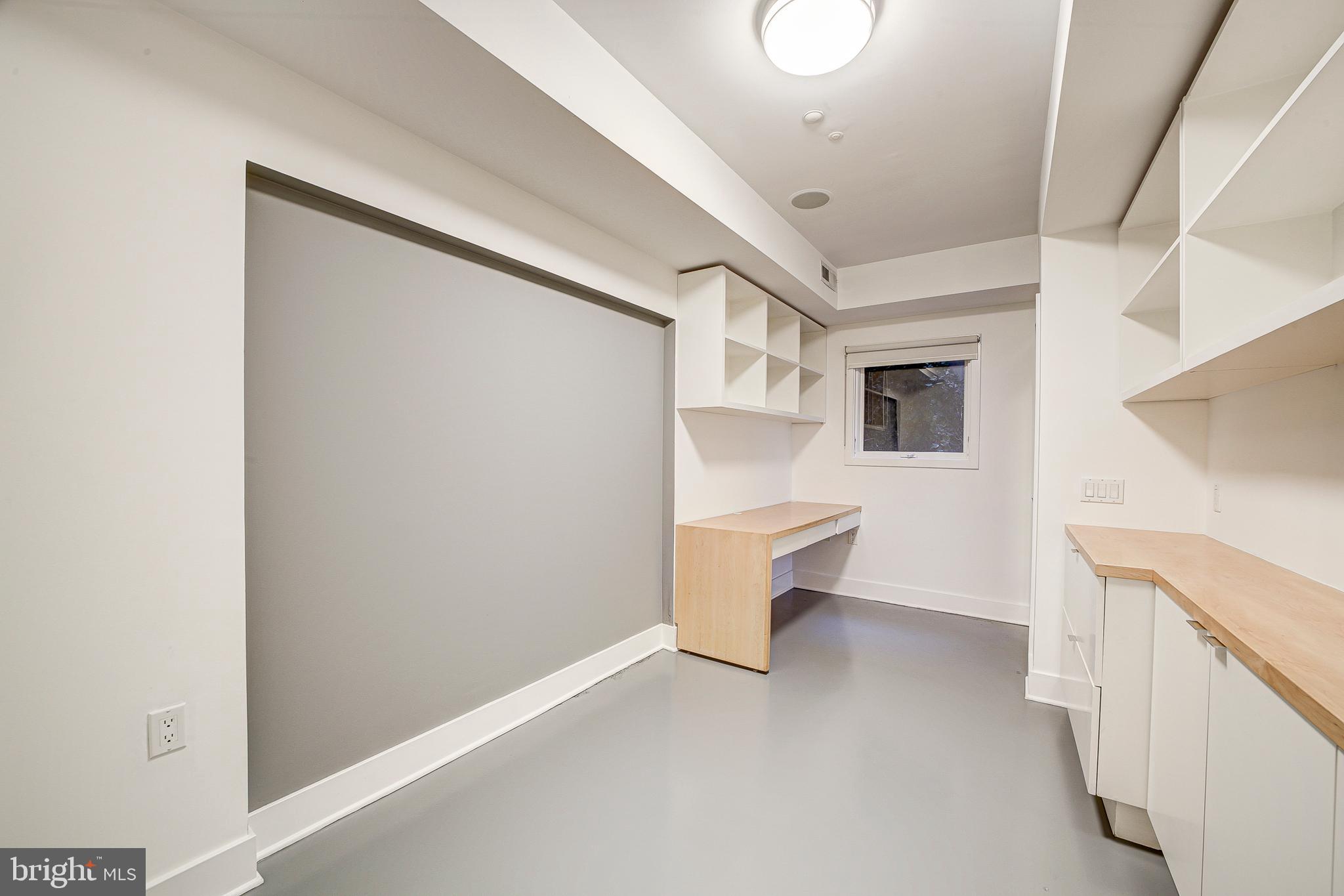 1517 Church Street Northwest, Unit A Washington, DC 20005 - Photo 17 of 23 a view of an empty room with a window