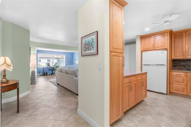 a kitchen with a sink cabinets and stainless steel appliances
