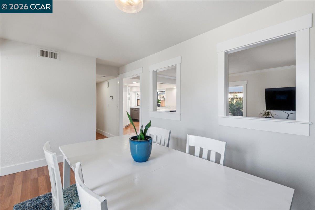 10005 Foxboro Circle San Ramon, CA 94583 - Photo 14 of 48 a view of a dining room with a table and chairs