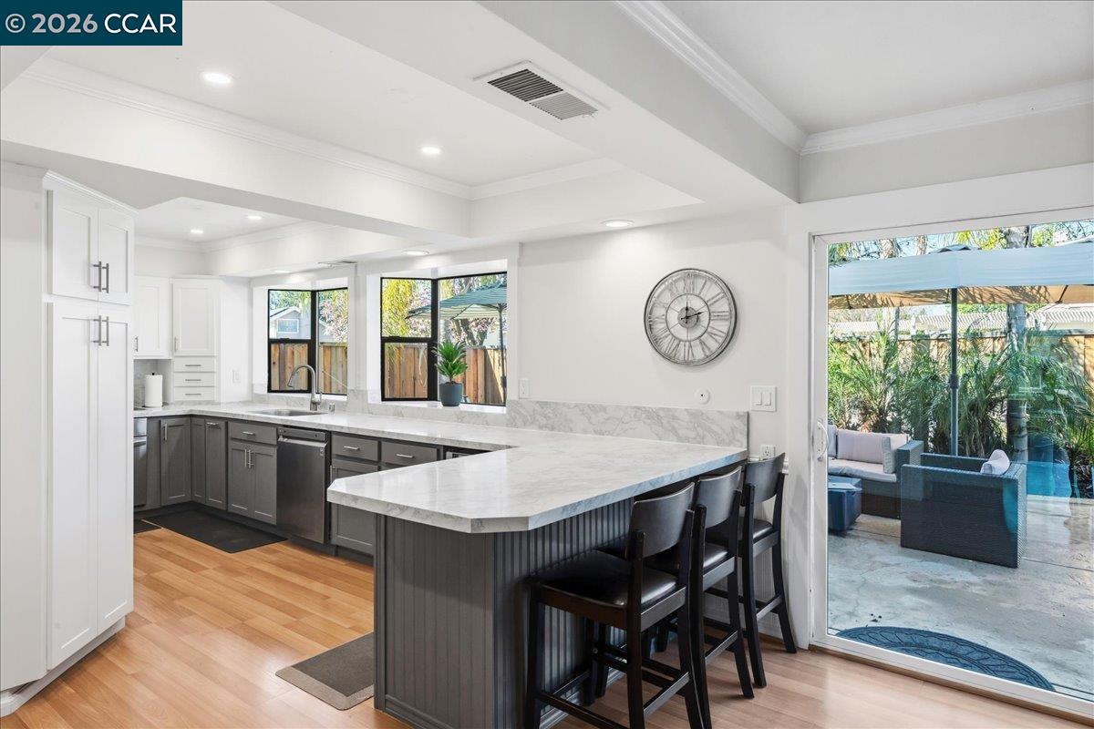 10005 Foxboro Circle San Ramon, CA 94583 - Photo 15 of 48 a kitchen with a table and chairs in it