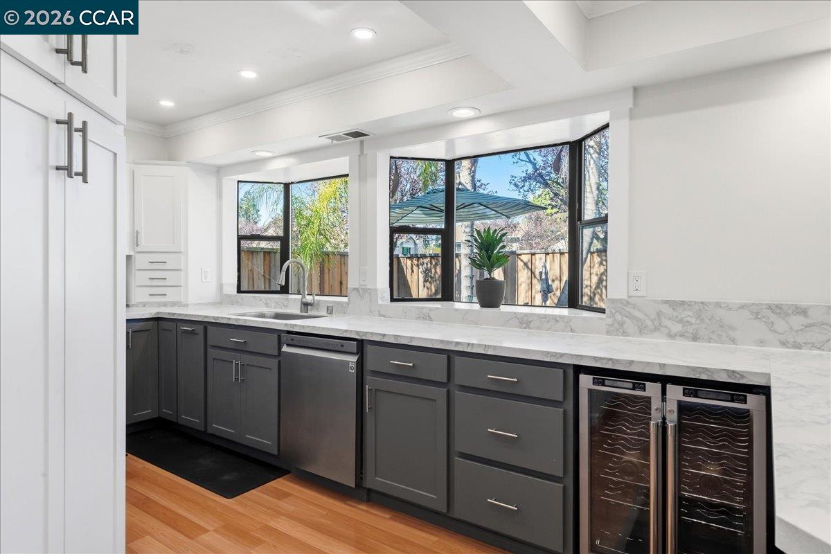 10005 Foxboro Circle San Ramon, CA 94583 - Photo 18 of 48 a spacious bathroom with a granite countertop sink and a large window