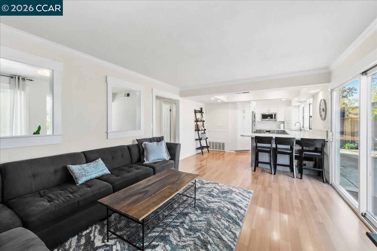 10005 Foxboro Circle San Ramon, CA 94583 - Photo 22 of 48 a living room with furniture and a wooden floor