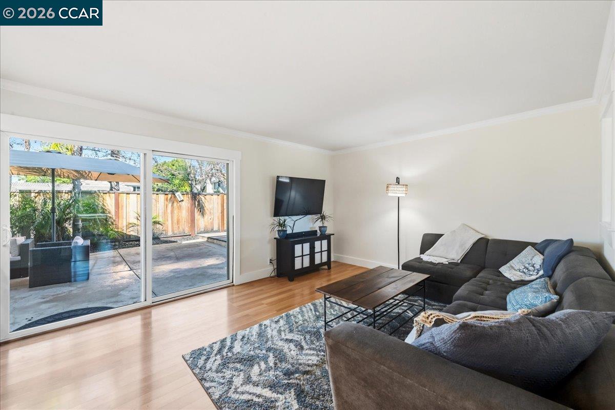 10005 Foxboro Circle San Ramon, CA 94583 - Photo 23 of 48 a living room with furniture and a flat screen tv