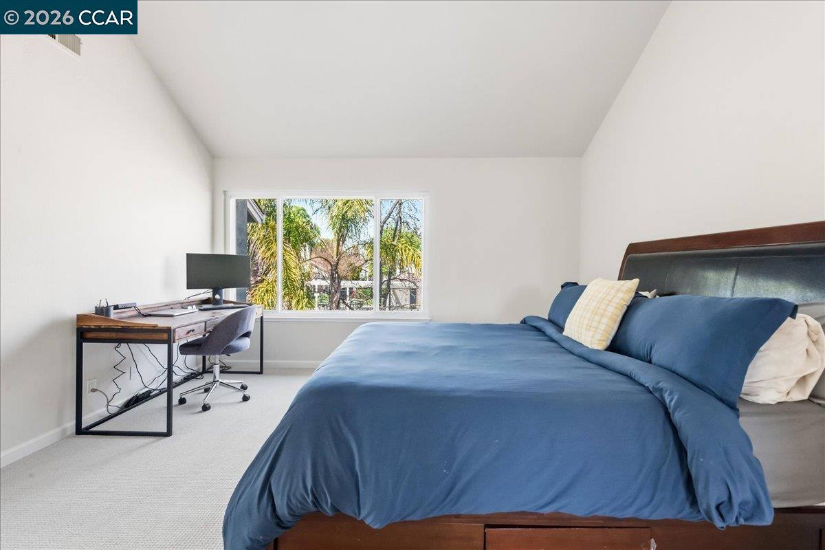 10005 Foxboro Circle San Ramon, CA 94583 - Photo 27 of 48 a bed sitting in a bedroom next to a window