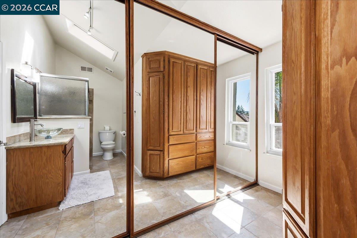 10005 Foxboro Circle San Ramon, CA 94583 - Photo 29 of 48 a bathroom with a tub and a sink