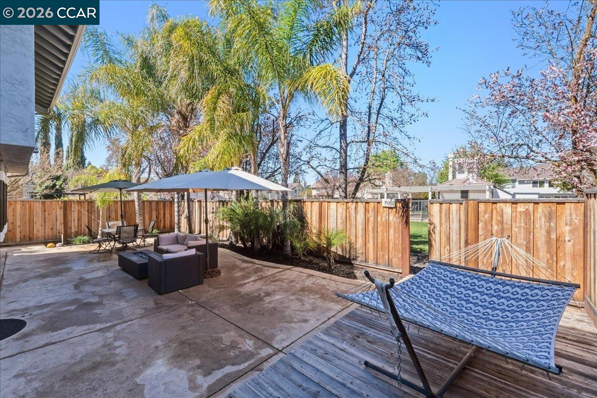 10005 Foxboro Circle San Ramon, CA 94583 - Photo 36 of 48 a backyard of a house with barbeque oven table and chairs