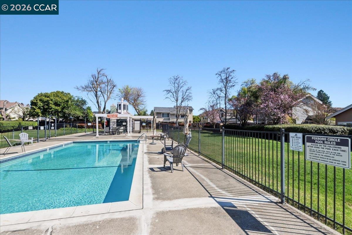 10005 Foxboro Circle San Ramon, CA 94583 - Photo 42 of 48 a view of a swimming pool with a patio