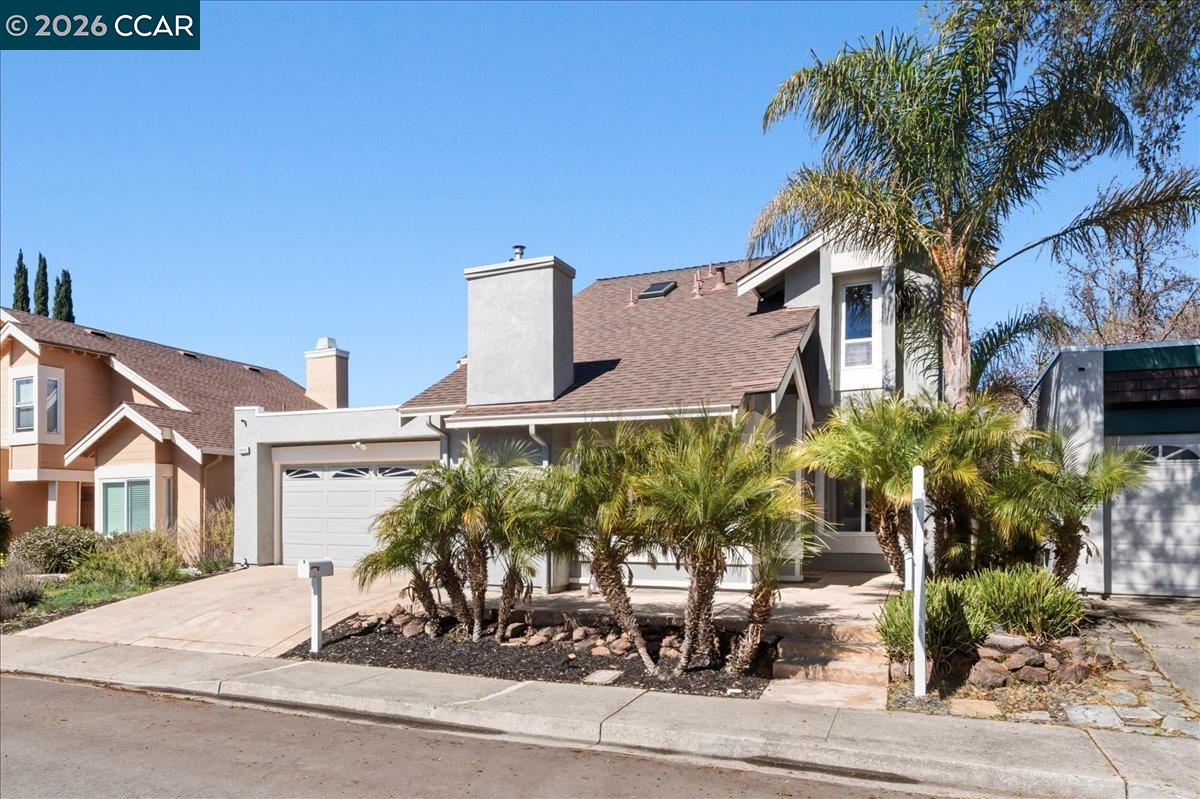 10005 Foxboro Circle San Ramon, CA 94583 - Photo 5 of 48 a front view of a house with garden