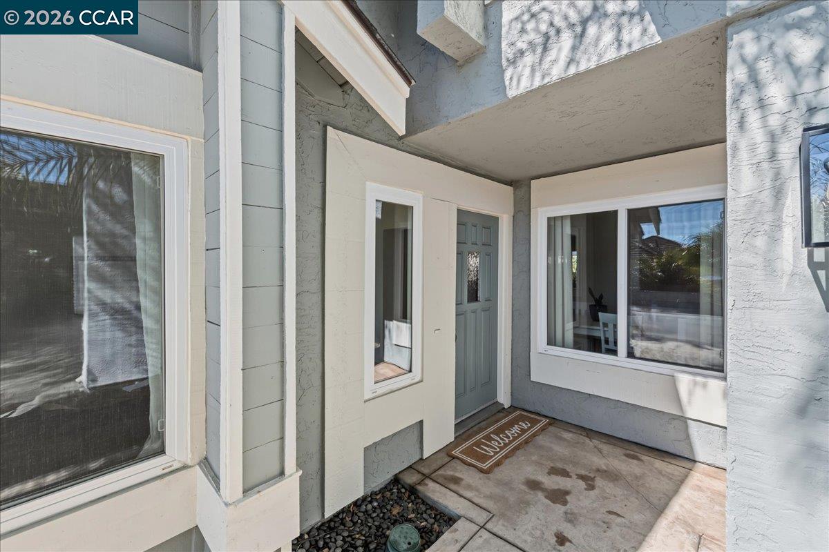 10005 Foxboro Circle San Ramon, CA 94583 - Photo 6 of 48 a view of a bedroom with wooden floor and windows