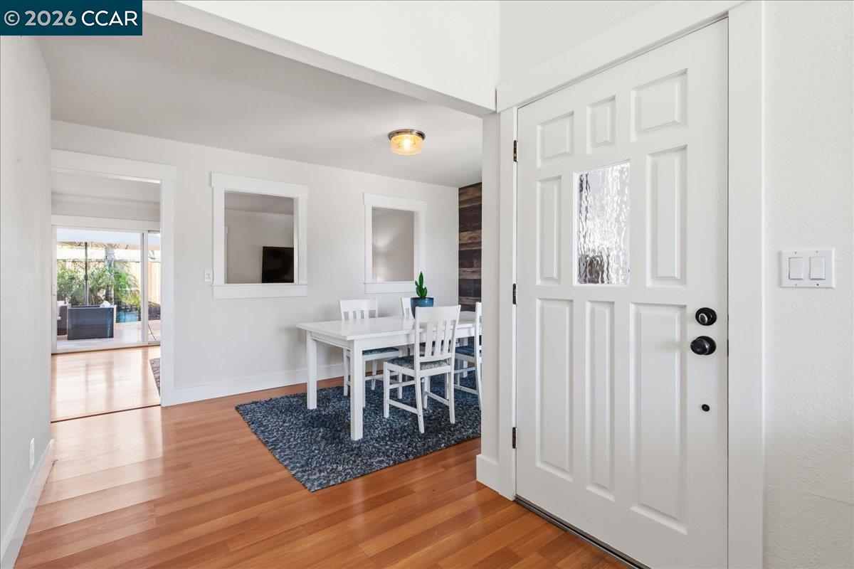10005 Foxboro Circle San Ramon, CA 94583 - Photo 7 of 48 a view of a livingroom with furniture and wooden floor